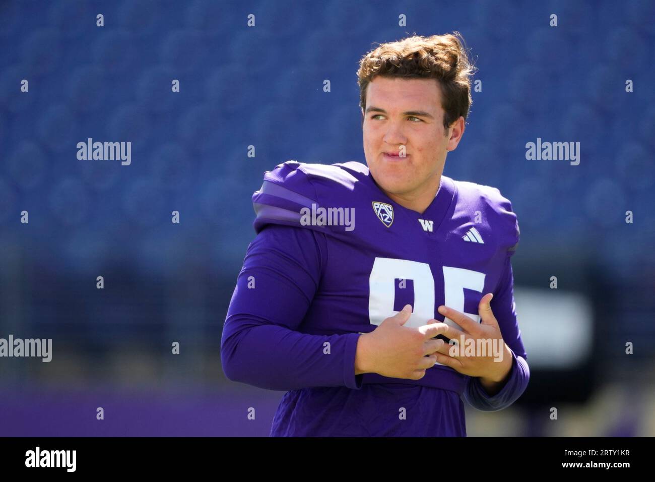 Washington place kicker Grady Gross looks on during warmups before an