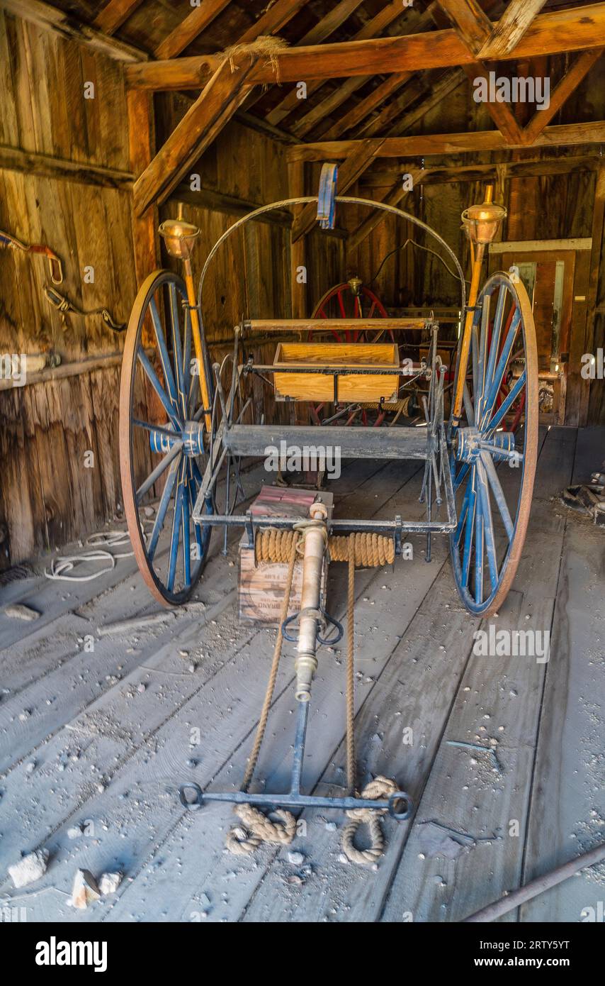 19th Century Hand Drawn Fire Hose Reel in the Bodie ghost town in California. Bodie is a ghost town in the Bodie Hills east of the Sierra Nevada. Stock Photo