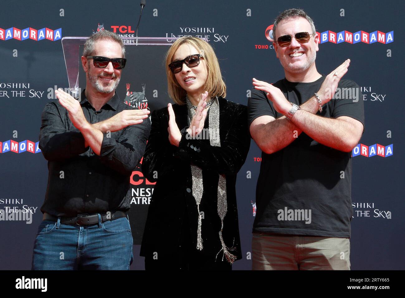September 14, 2023, Los Angeles, California, USA: LOS ANGELES - SEP 14, 2023: Marc Geiger, Yoshiki, Brian Ahern at a ceremony honoring Japanese musician Yoshiki with hand and foot prints at the TCL Chinese Theatre IMAX (Credit Image: © Nina Prommer/ZUMA Press Wire) EDITORIAL USAGE ONLY! Not for Commercial USAGE! Stock Photo