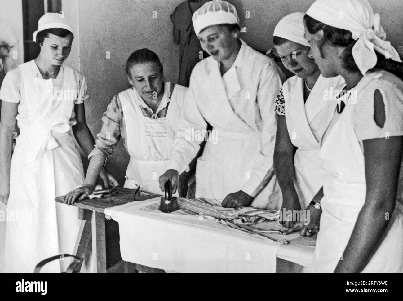 Three people table house germany Black and White Stock Photos & Images Alamy