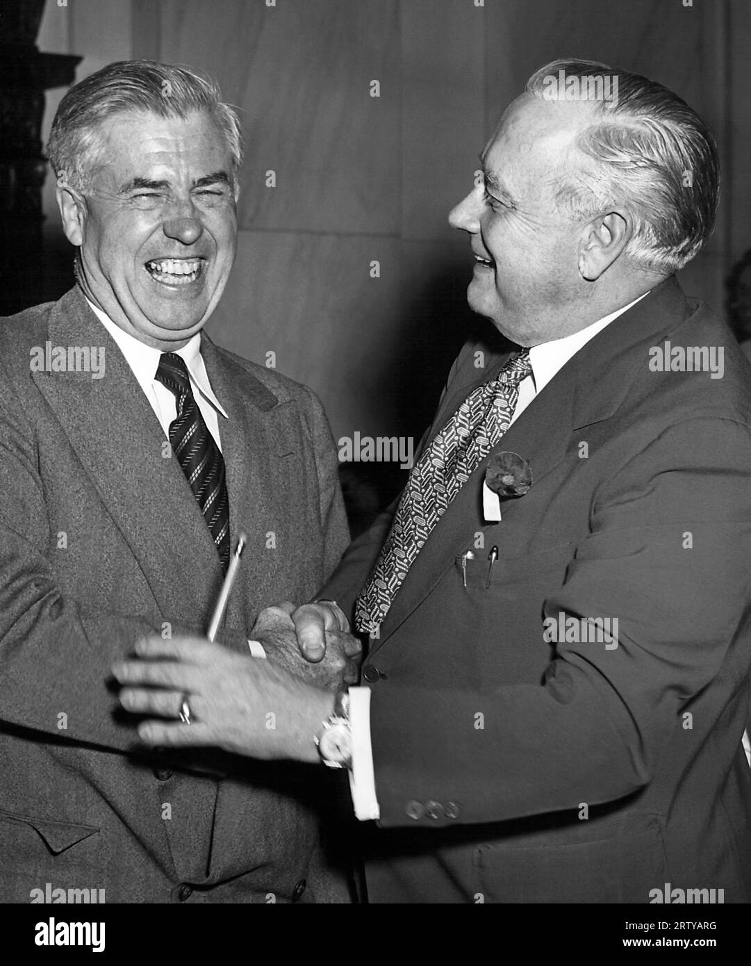 Washington, D.C.    May 29, 1948 Henry Wallace and Senator Alexander Wiley shakes hands after Wallace's testimony before the Senate Judiciary Committee. Stock Photo