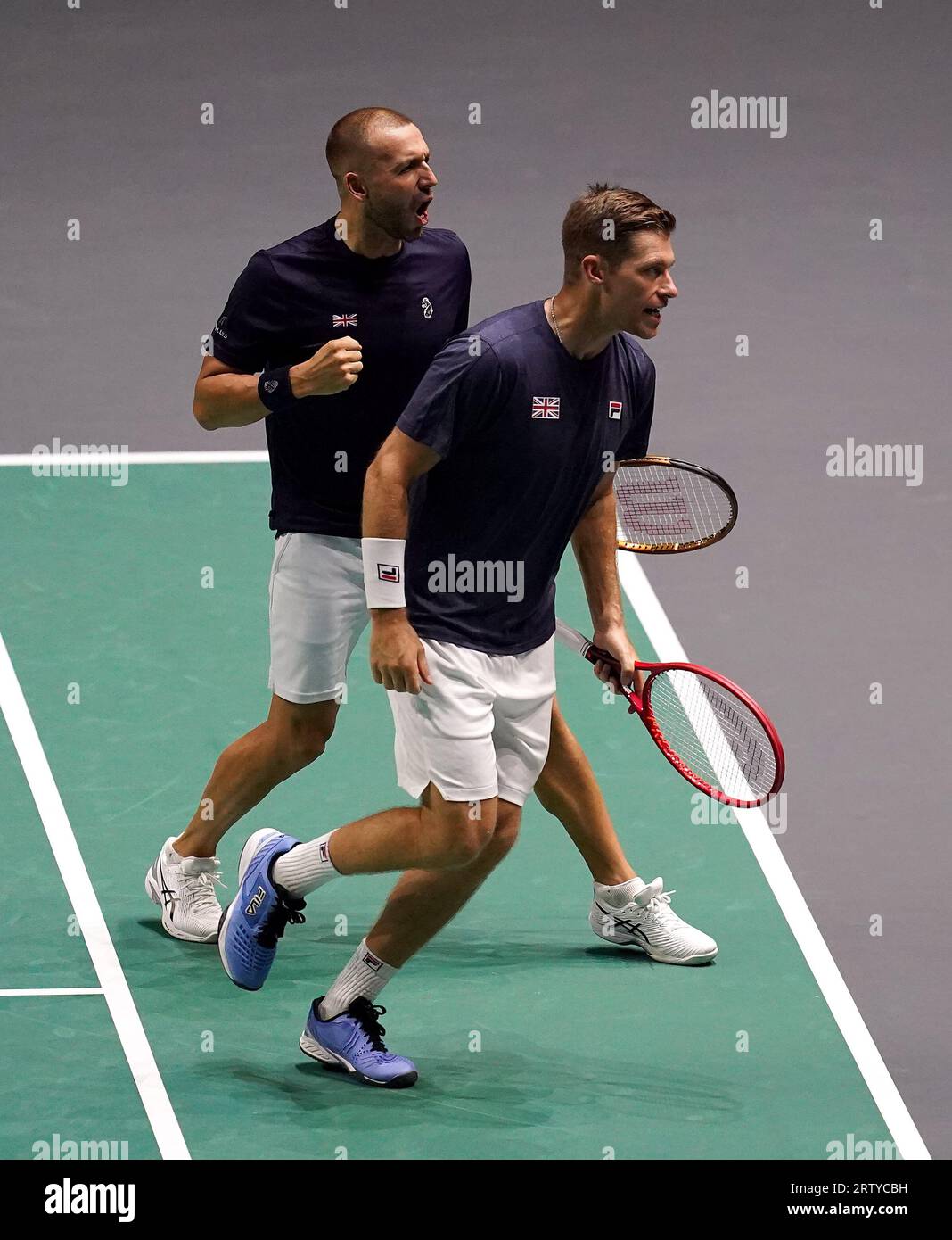 Great Britain's Dan Evans and Neal Skupski celebrates winning the first
