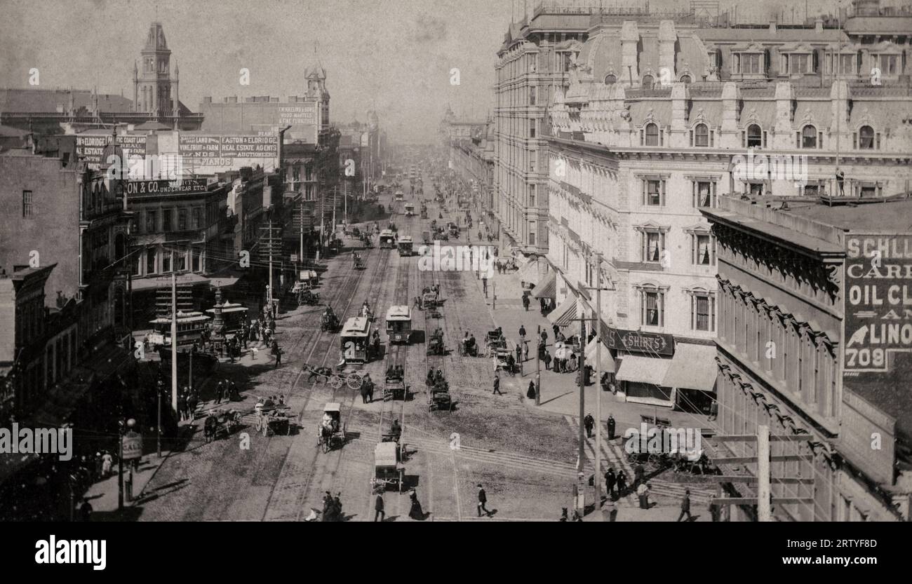 San Francisco, California    c  1890 A bird's-eye view of Market Street in San Francisco with horse-drawn carriages, cable cars, and pedestrians on the main commercial street. Stock Photo