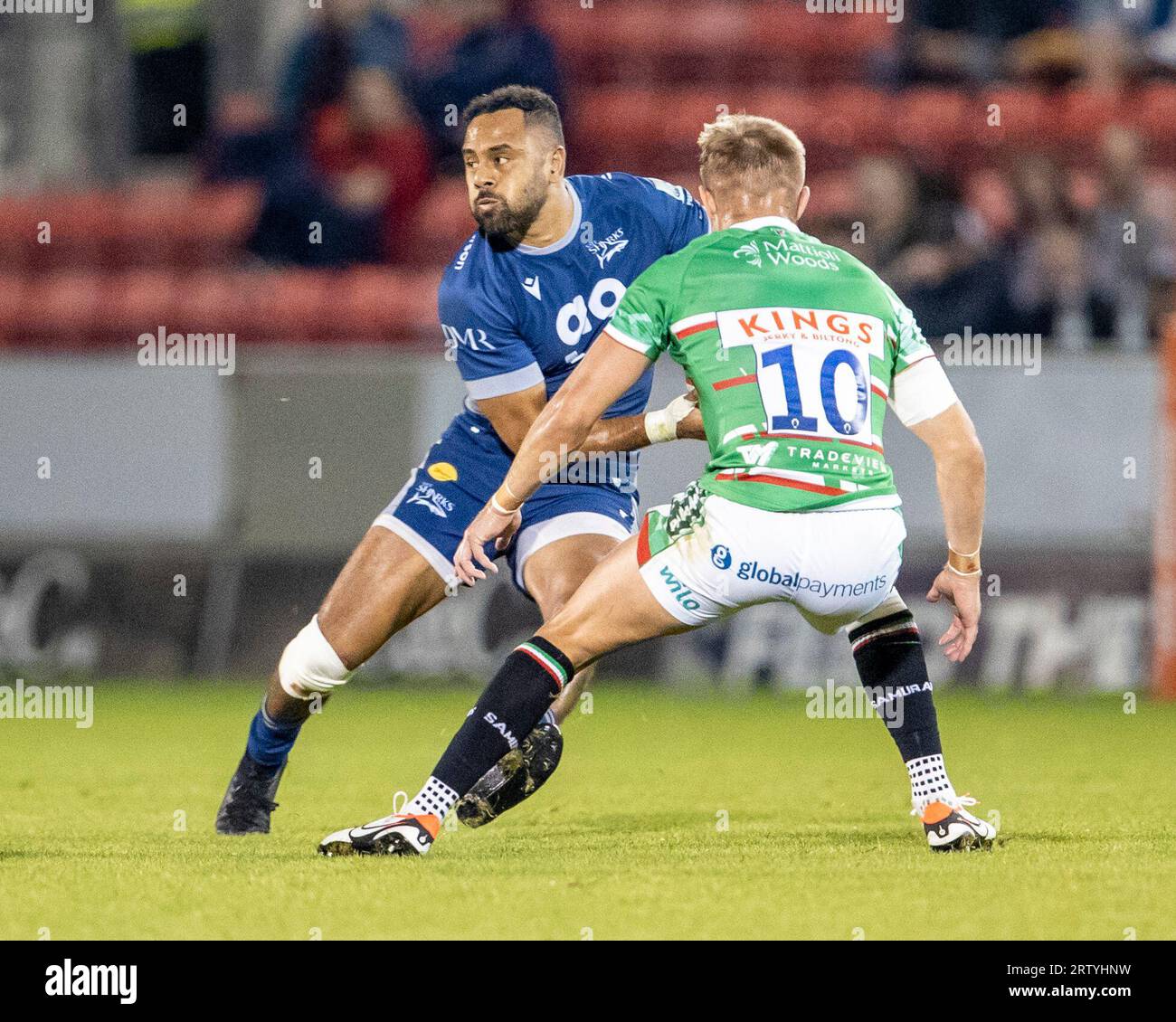 15th September 2023; AJ Bell Stadium, Salford, Lancashire, England; English Premiership Rugby Cup, Sale Sharks versus Leicester Tigers; Telusa Veainu of Sale Sharks under pressure from Charlie Atkinson of Leicester Tigers Credit: Action Plus Sports Images/Alamy Live News Stock Photo