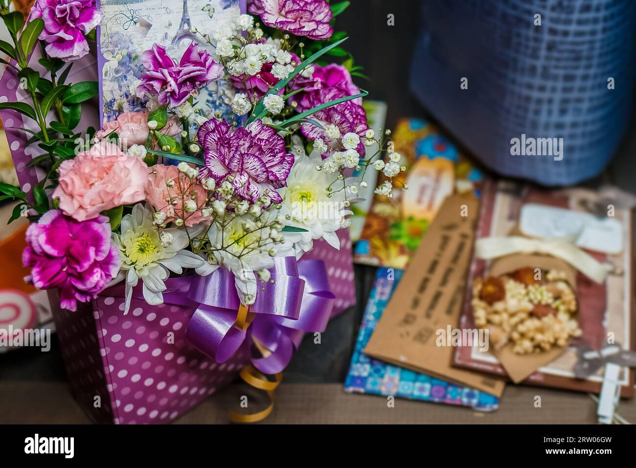 Type and sample of a gift picture, a blank for a calendar, a birthday, a holiday, flowers with postcards. Stock Photo