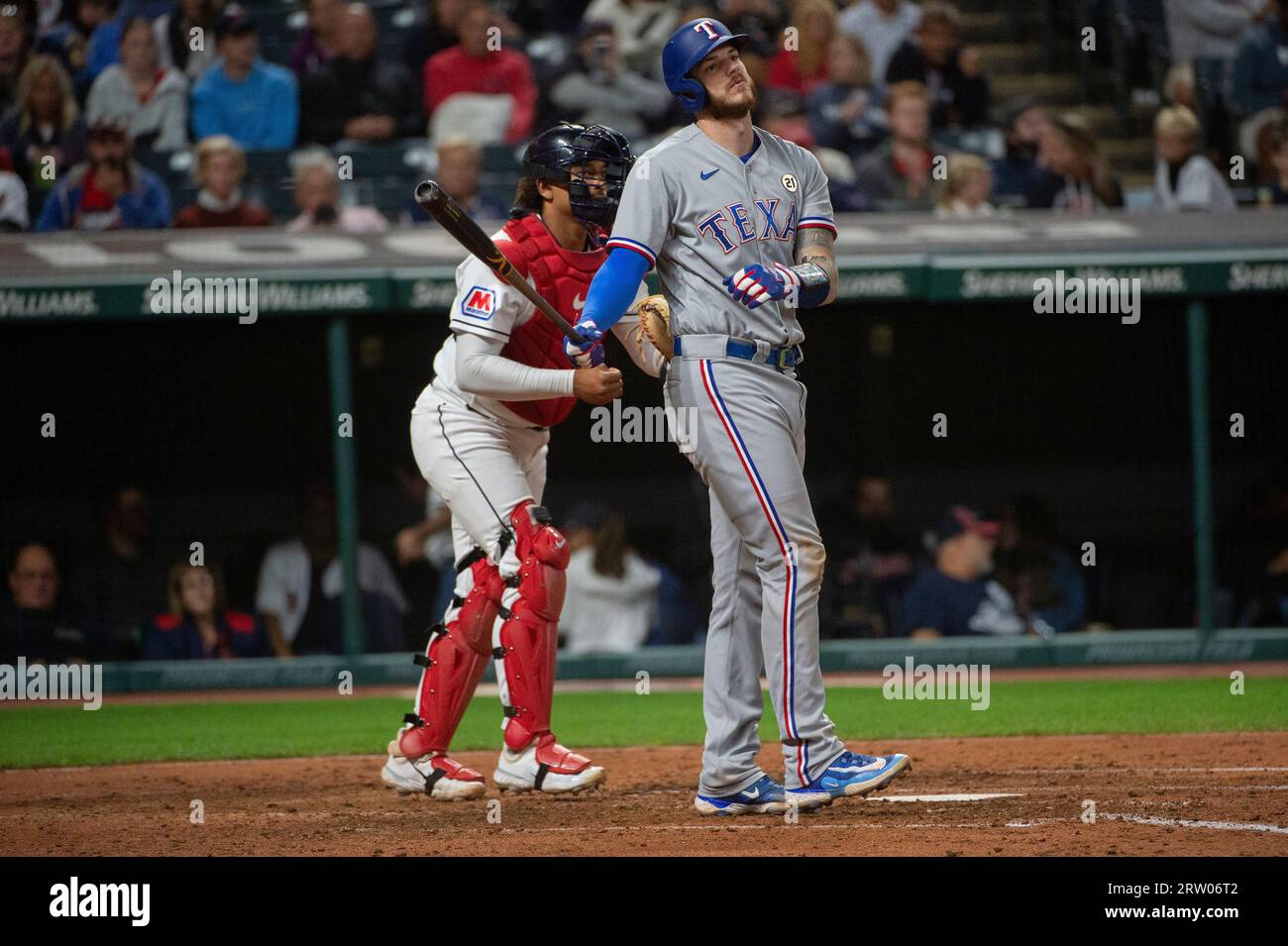 Texas Rangers catcher Jonah Heim reacts after striking out during