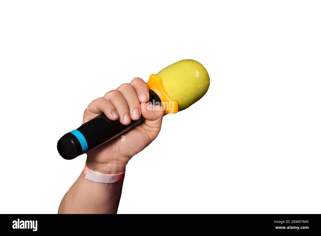 Female person hand close-up holding microphone professional karaoke singing equipment white background isolated. Stock Photo