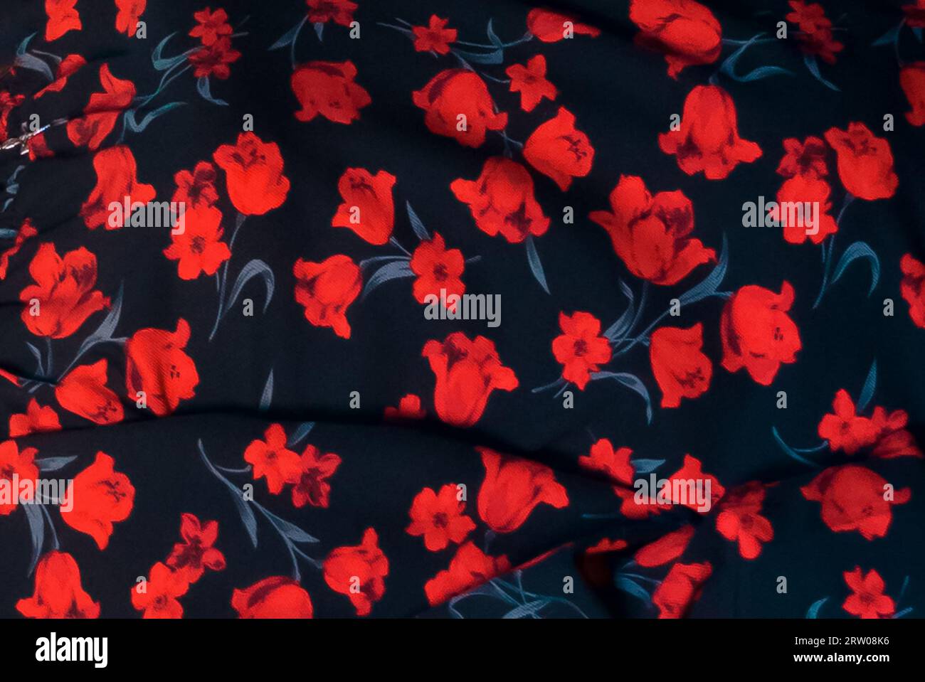 Abstract pattern of red flowers design background sample material soft focus. Stock Photo