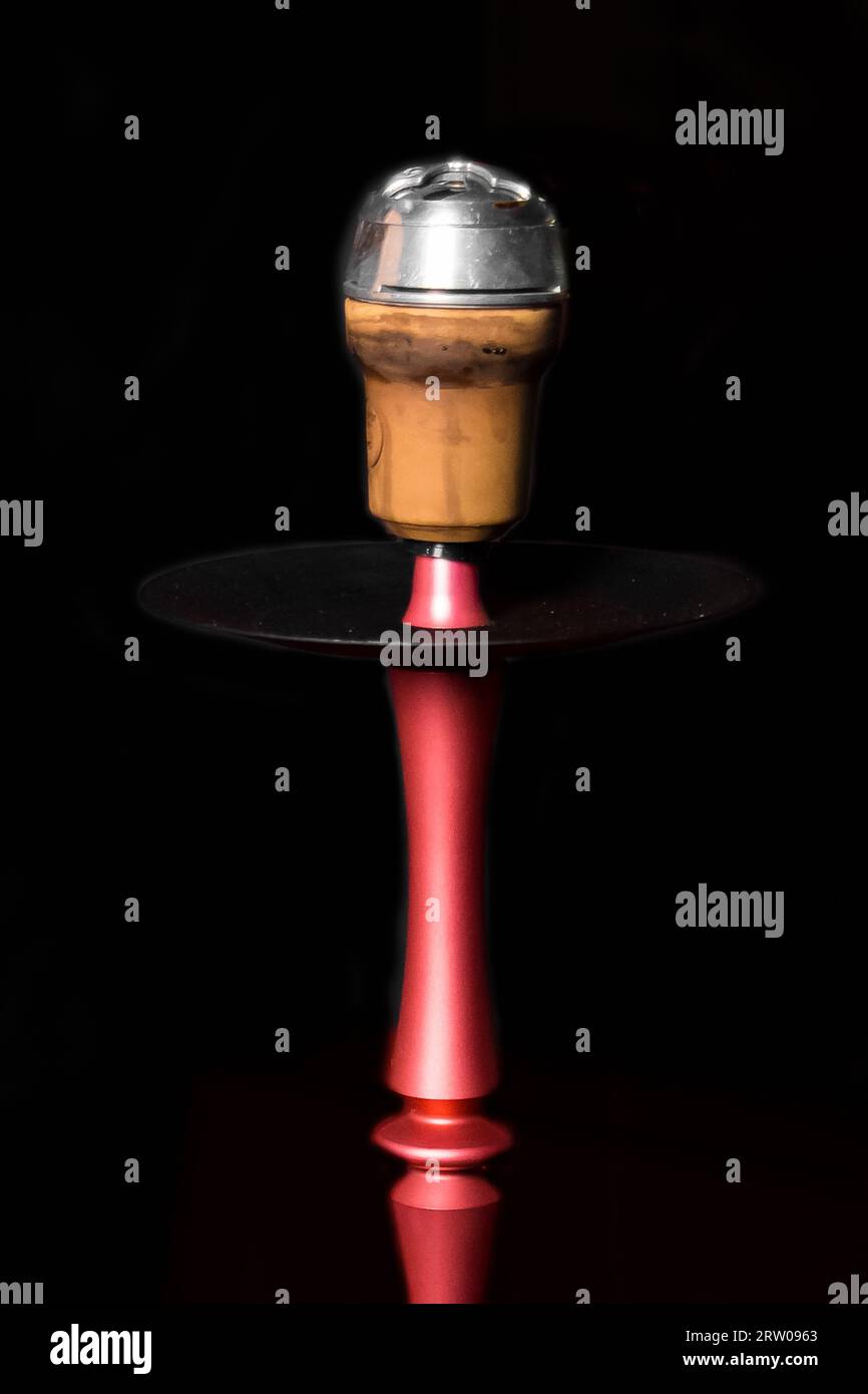 Clay object hookah head smoking on a black background Stock Photo Alamy