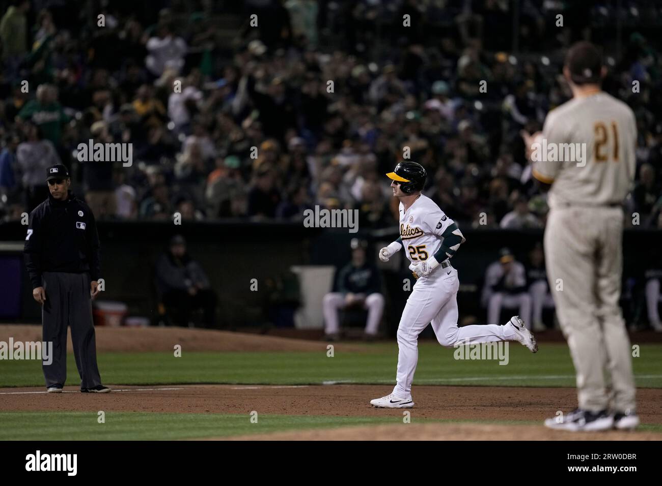 Oakland Athletics' Brent Rooker (25) runs the bases after hitting a ...