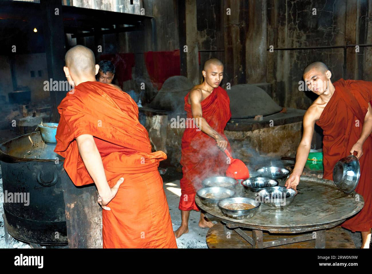 Monk with dish hi-res stock photography and images - Alamy