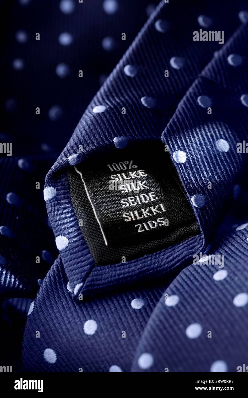 Label of a tie made of silk. Short depth of field, the sharpness is in