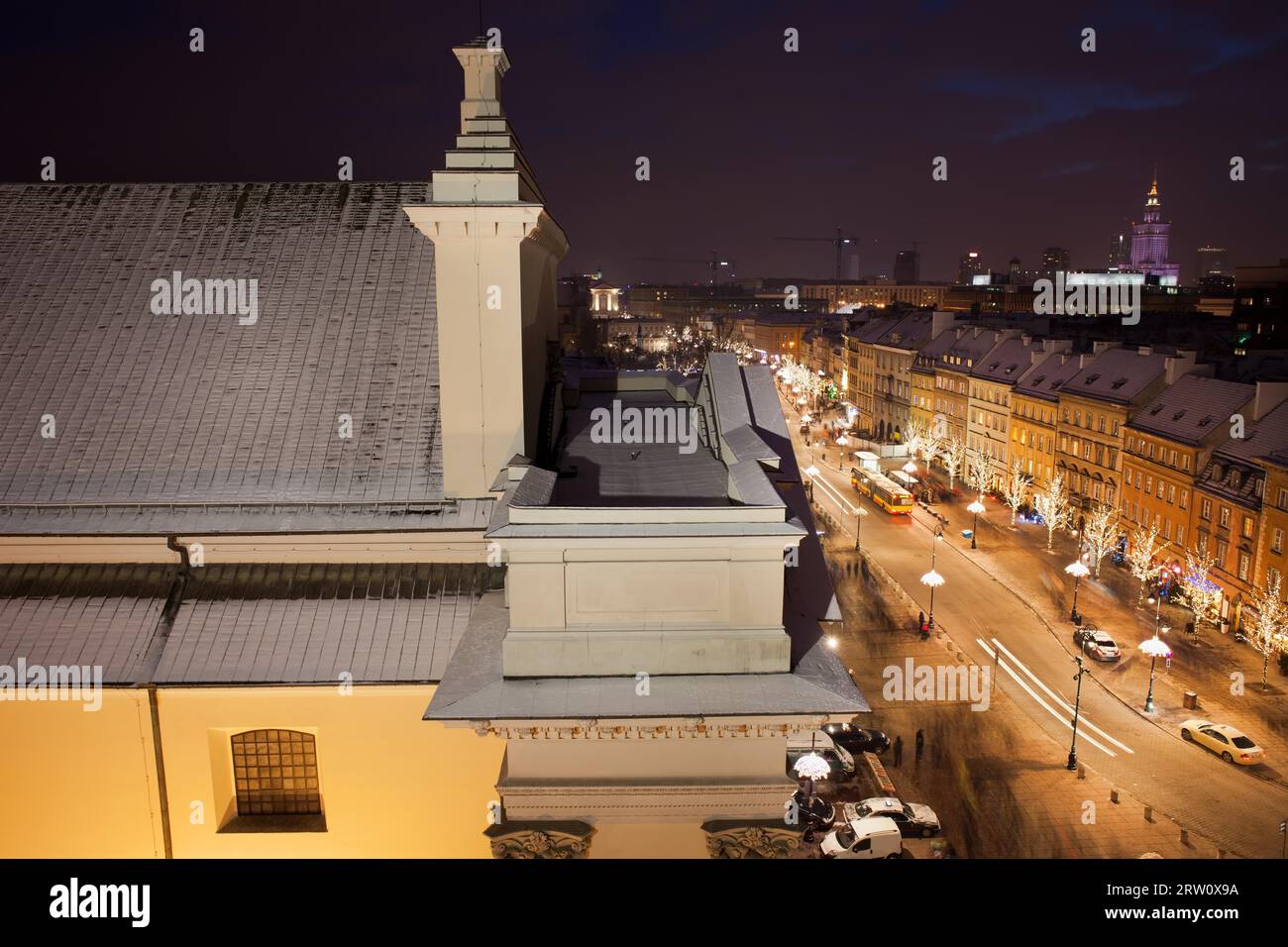 Poland, capital city of Warsaw, St. Anne Church and Krakowskie Przedmiescie street by night from above Stock Photo