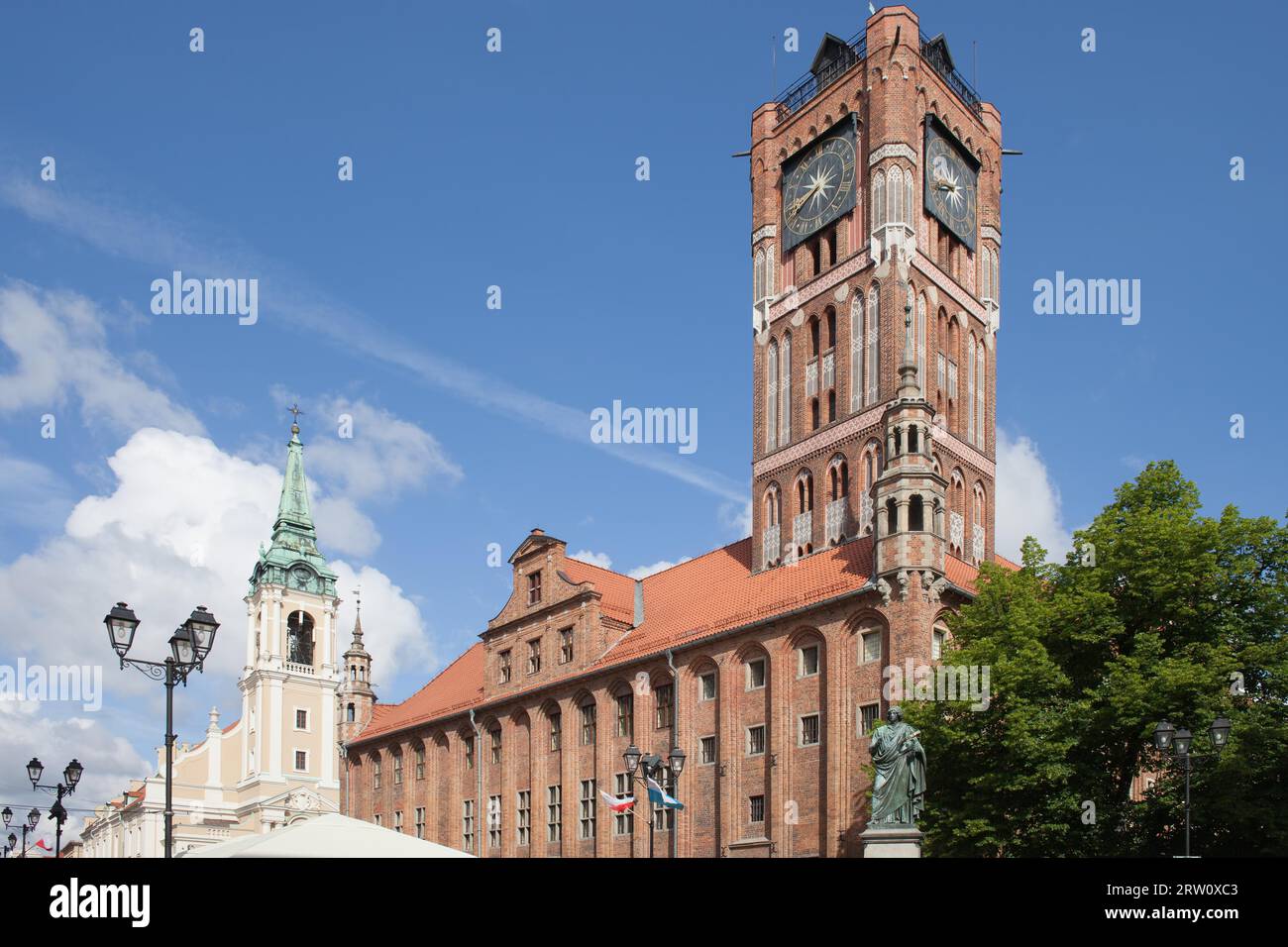 Old City Town Hall (Polish: Ratusz Staromiejski) and Church of the Holy Spirit in Torun, Poland Stock Photo