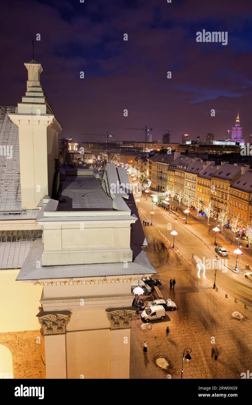 Poland, city of Warsaw, St. Anne Church and Krakowskie Przedmiescie street by night Stock Photo