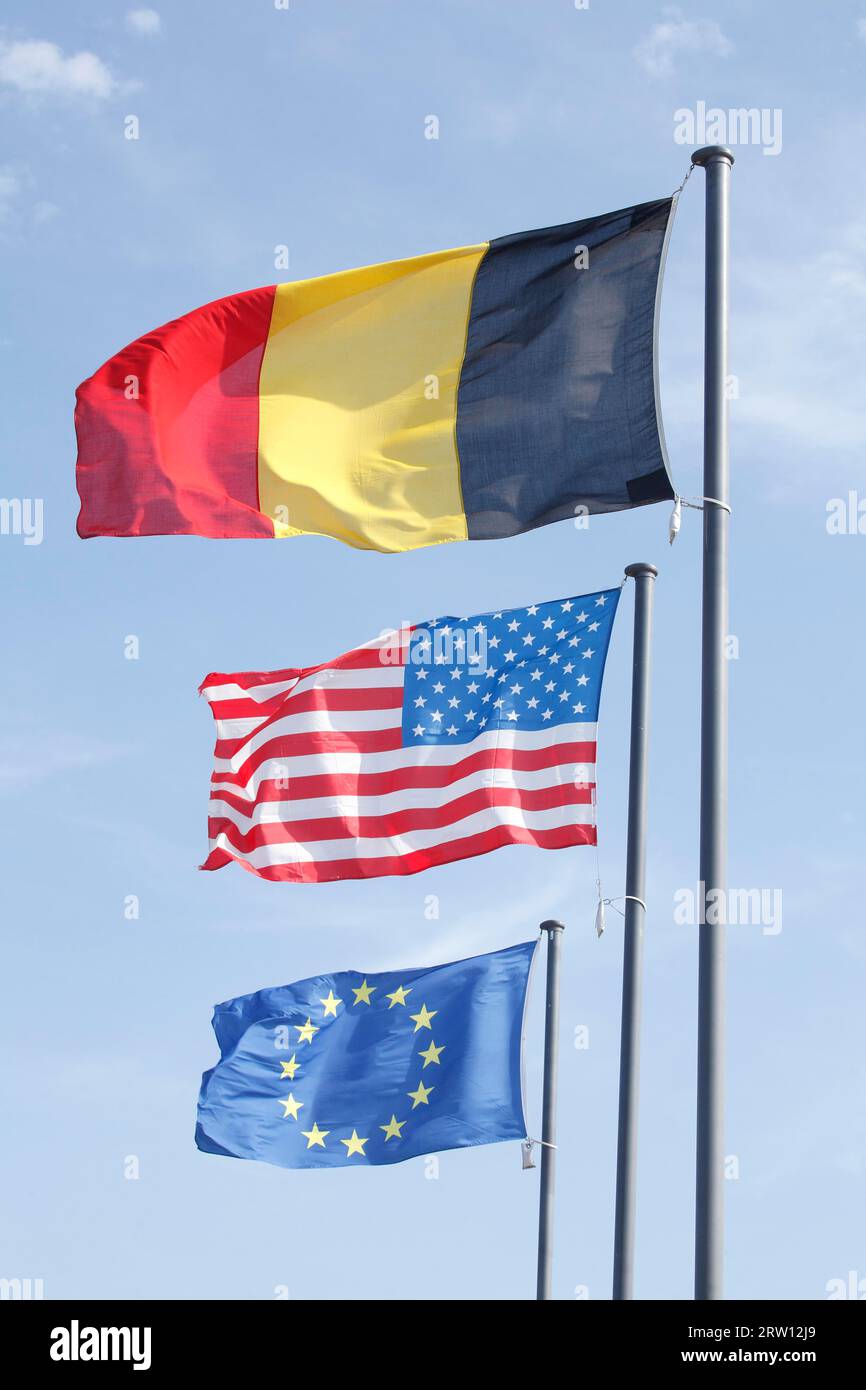 Belgian flag, Flag of the USA, European flag, blowing in the wind, Blue sky, Germany Stock Photo