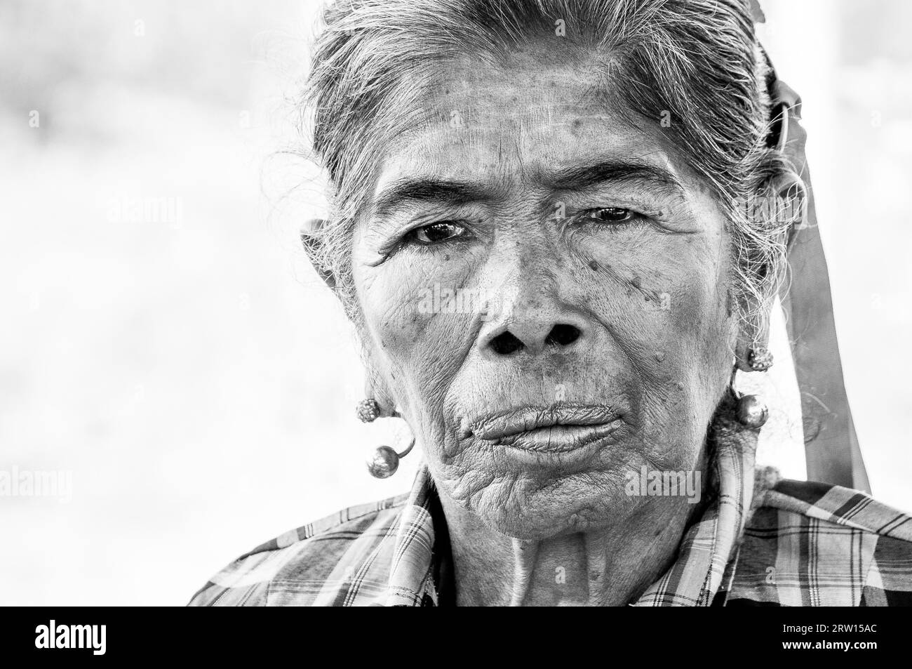 Pantanal, PARAGUAY in August 2015: Black and white portrait of an old indigenous woman in northern Paraguay. The the indigenous people of Paraguay Stock Photo