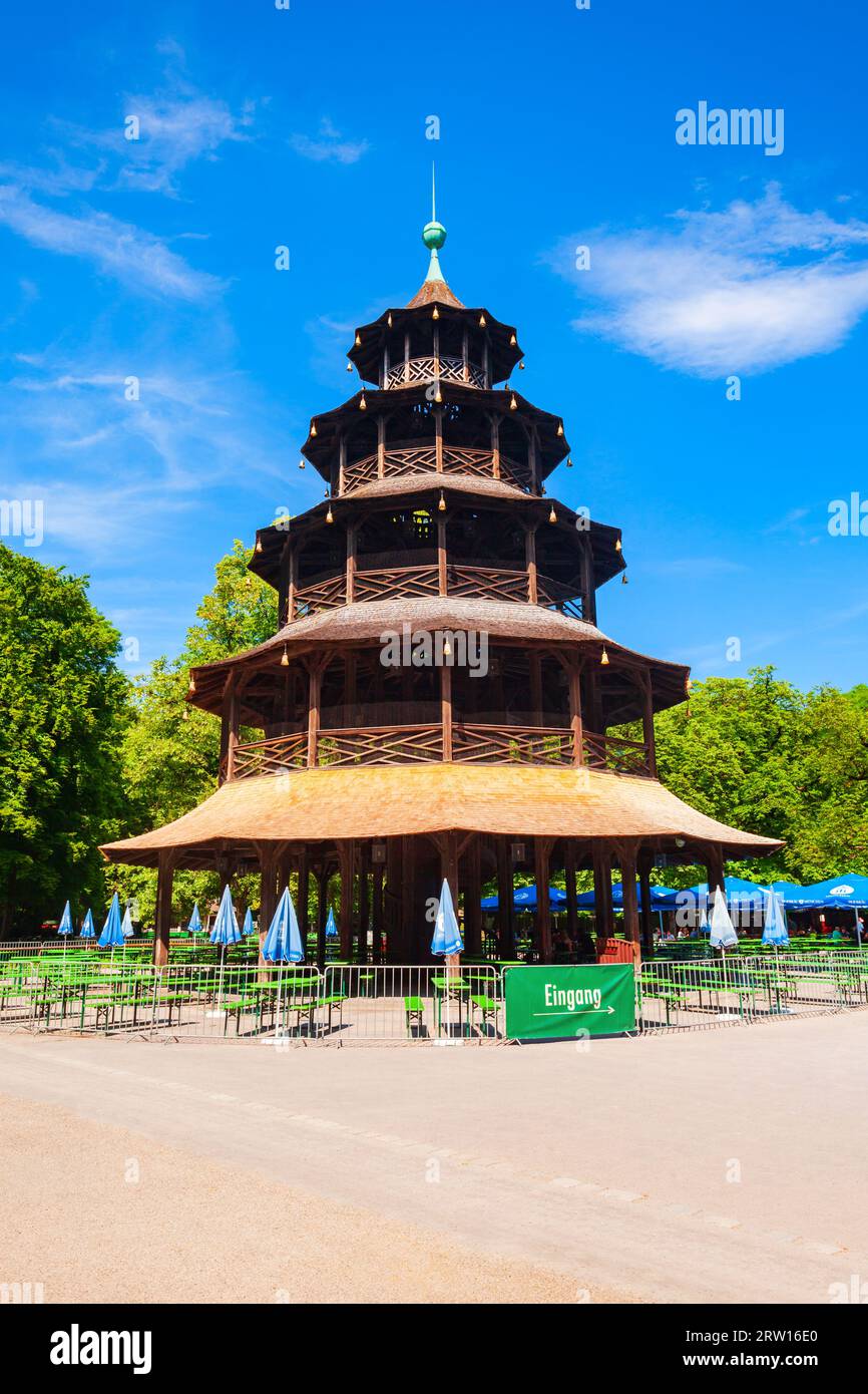 Munich, Germany - July 06, 2021: Chinese Tower or Chinesischer Turm is a 25 metre high wooden tower in the English Garden or Englischer Garten, a publ Stock Photo