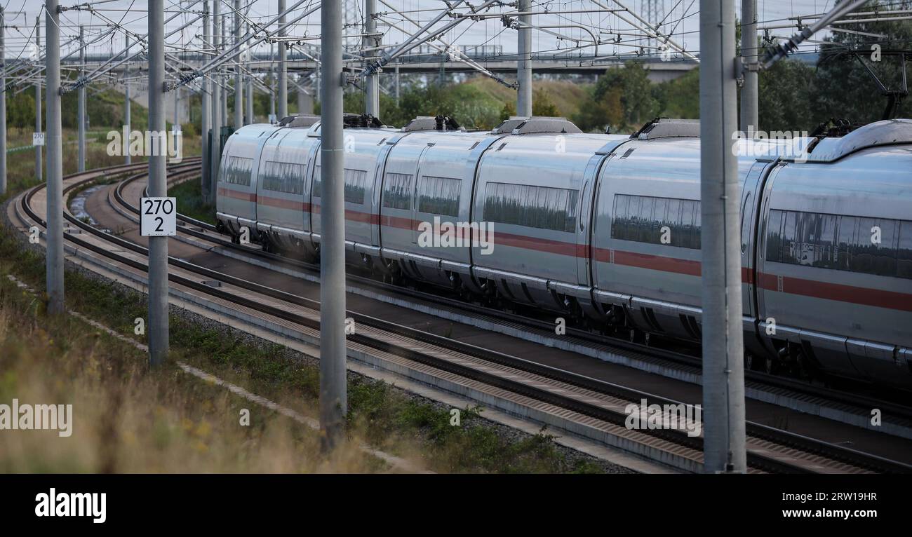 Schkopau, Germany. 13th Sep, 2023. An ICE 3 train is heading north on the new Berlin-Munich line southwest of Halle (Saale). Credit: Jan Woitas/dpa/Alamy Live News Stock Photo
