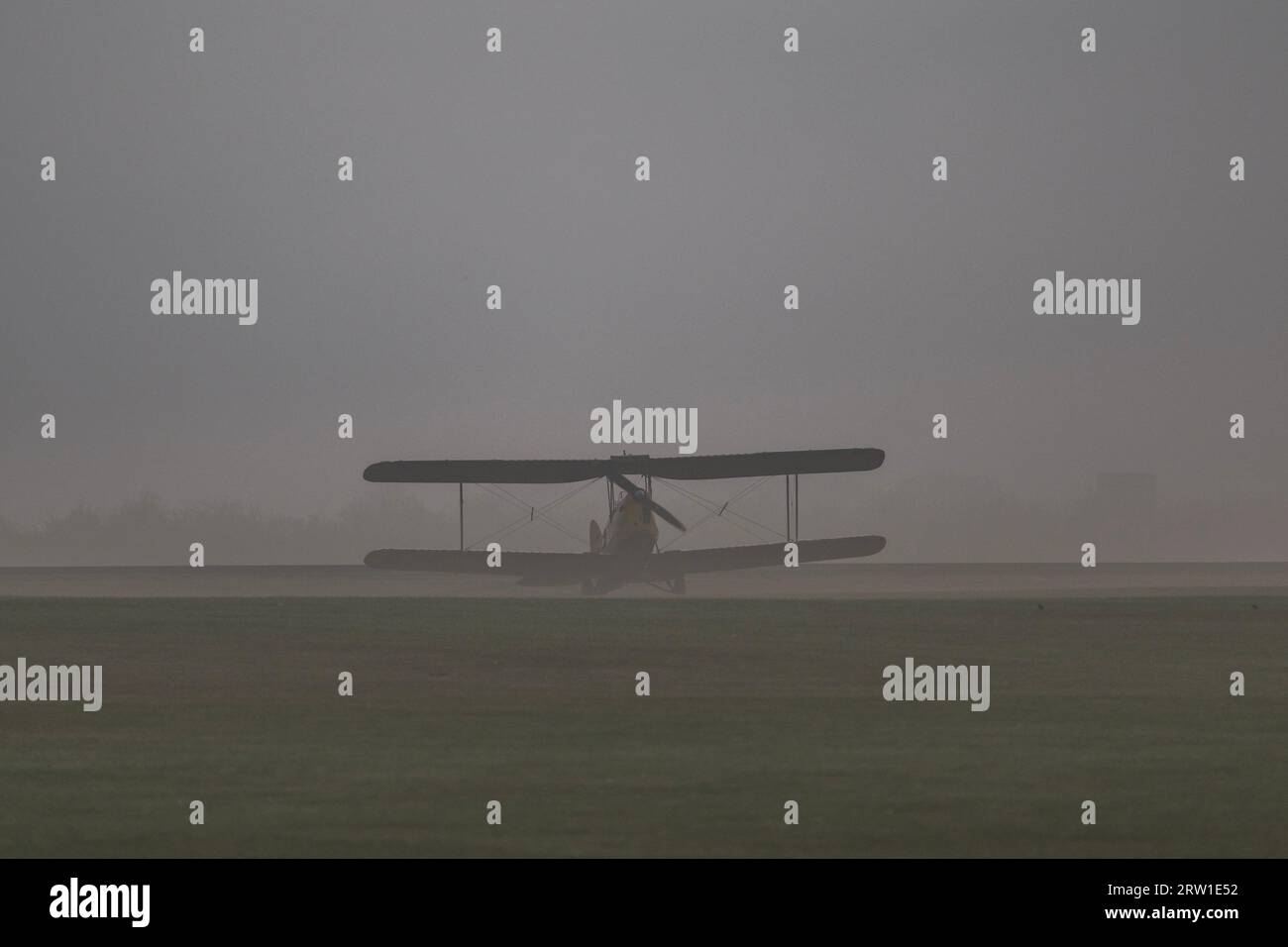 Duxford, UK. 16th Sep, 2023. A Tiger Moth takes off in the mist - The Duxford Battle of Britain Air Show at the Imperial War Museum (IWM) Duxford. Credit: Guy Bell/Alamy Live News Stock Photo