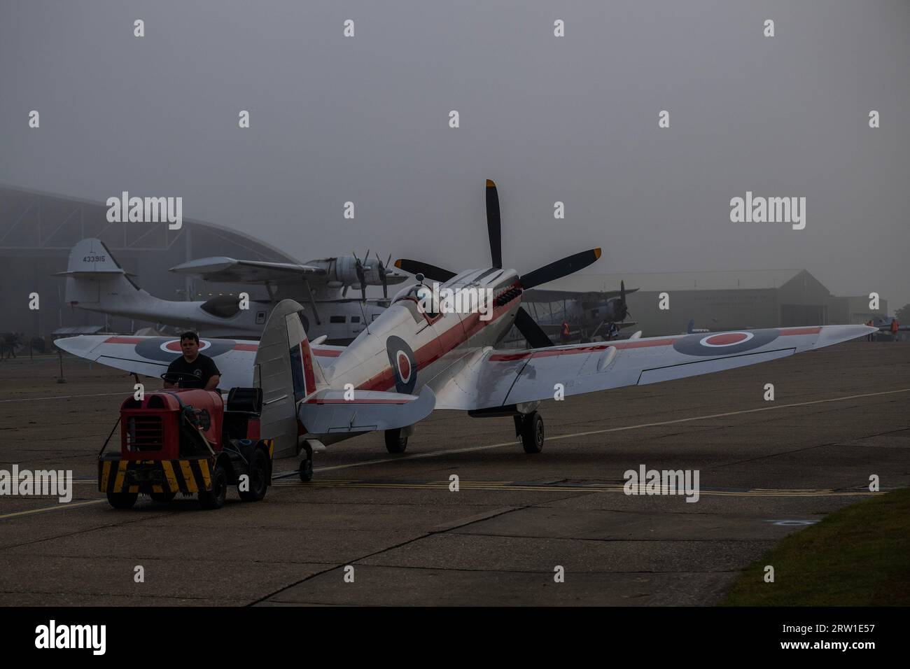 Duxford, UK. 16th Sep, 2023. Spitfires are brought out on to the flightline in the dawn mist - The Duxford Battle of Britain Air Show at the Imperial War Museum (IWM) Duxford. Credit: Guy Bell/Alamy Live News Stock Photo