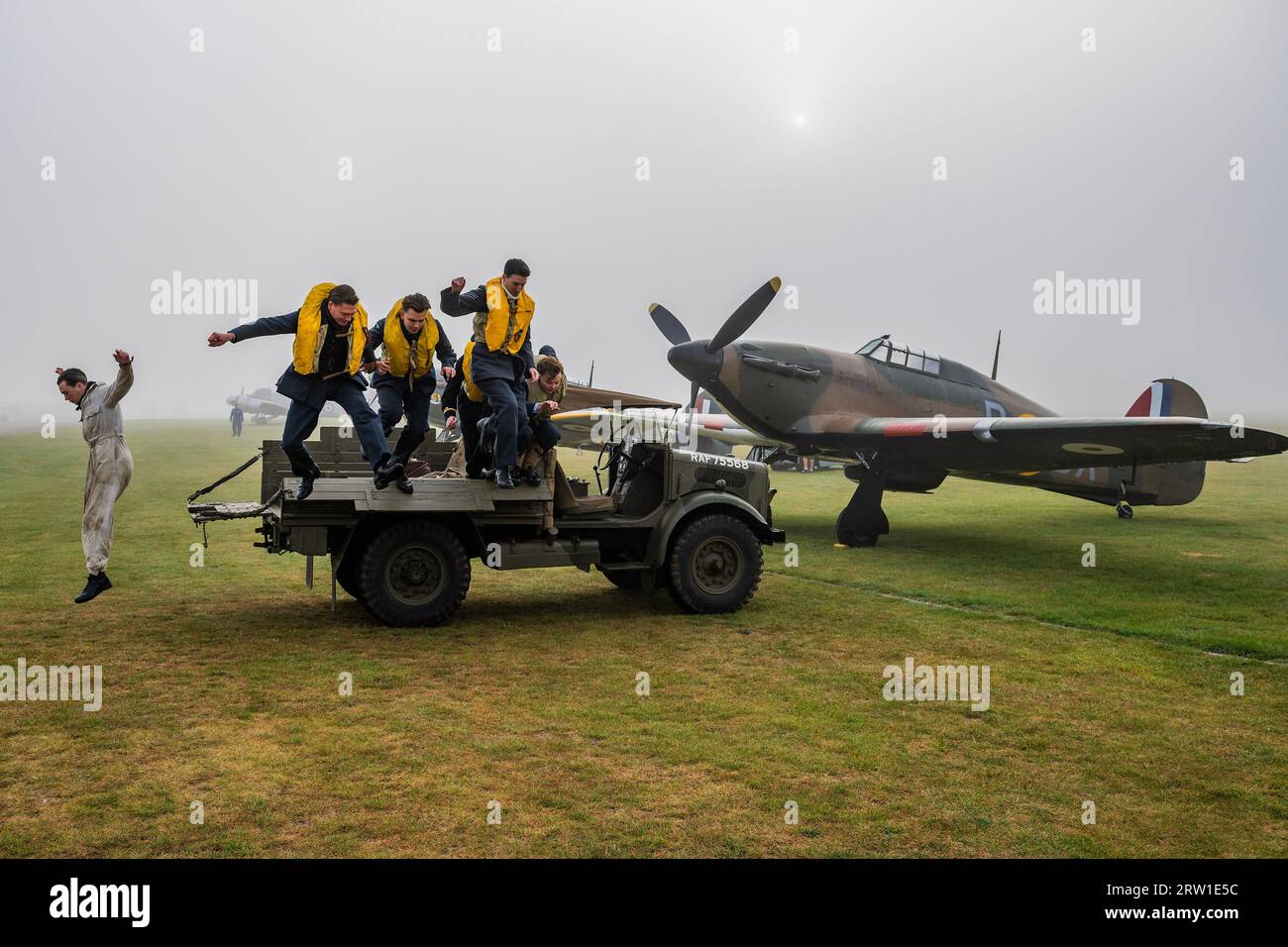 Duxford, UK. 16th Sep, 2023. Spirit of Britain living history re-enactors drive out on the flight line and scramble for their spitfires and hurricanes - The Duxford Battle of Britain Air Show at the Imperial War Museum (IWM) Duxford. Credit: Guy Bell/Alamy Live News Stock Photo
