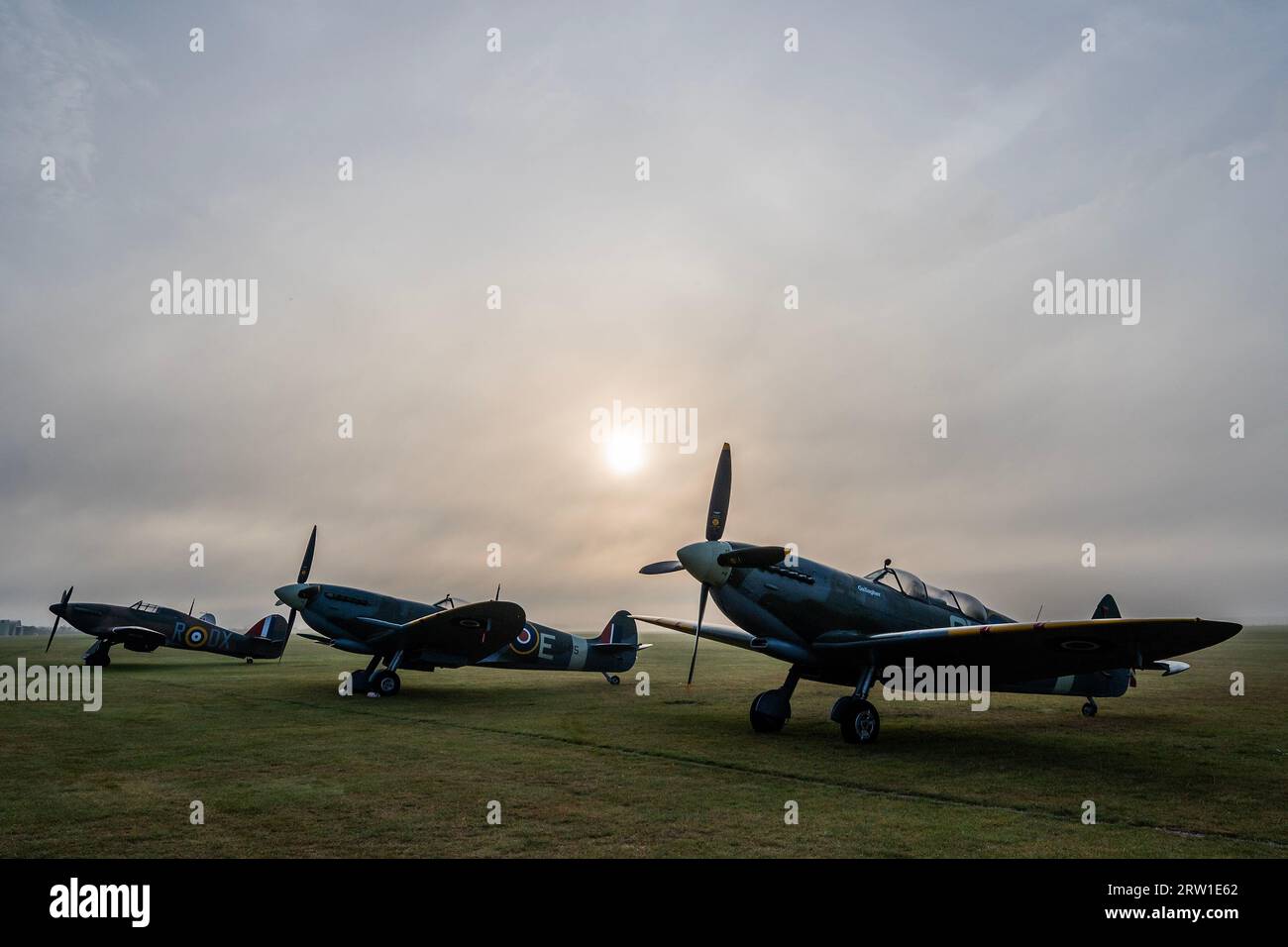 Duxford, UK. 16th Sep, 2023. Spitfires and hurricanes lined up in the dawn light - The Duxford Battle of Britain Air Show at the Imperial War Museum (IWM) Duxford. Credit: Guy Bell/Alamy Live News Stock Photo