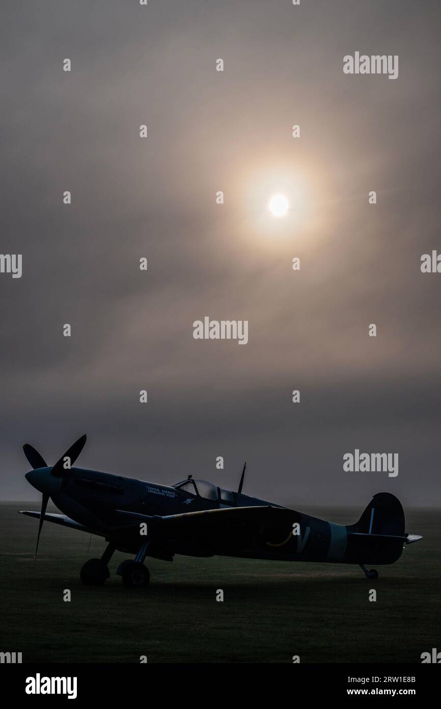 Duxford, UK. 16th Sep, 2023. A Spitfire lined up in the dawn light - The Duxford Battle of Britain Air Show at the Imperial War Museum (IWM) Duxford. Credit: Guy Bell/Alamy Live News Stock Photo