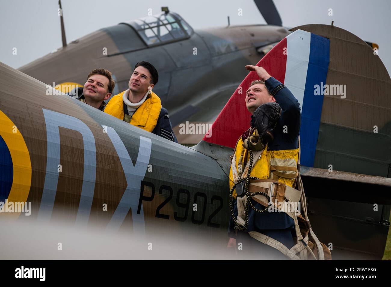 Duxford, UK. 16th Sep, 2023. Spirit of Britain living history re-enactors drive out on the flight line and make final inspections of a Hurricane - The Duxford Battle of Britain Air Show at the Imperial War Museum (IWM) Duxford. Credit: Guy Bell/Alamy Live News Stock Photo