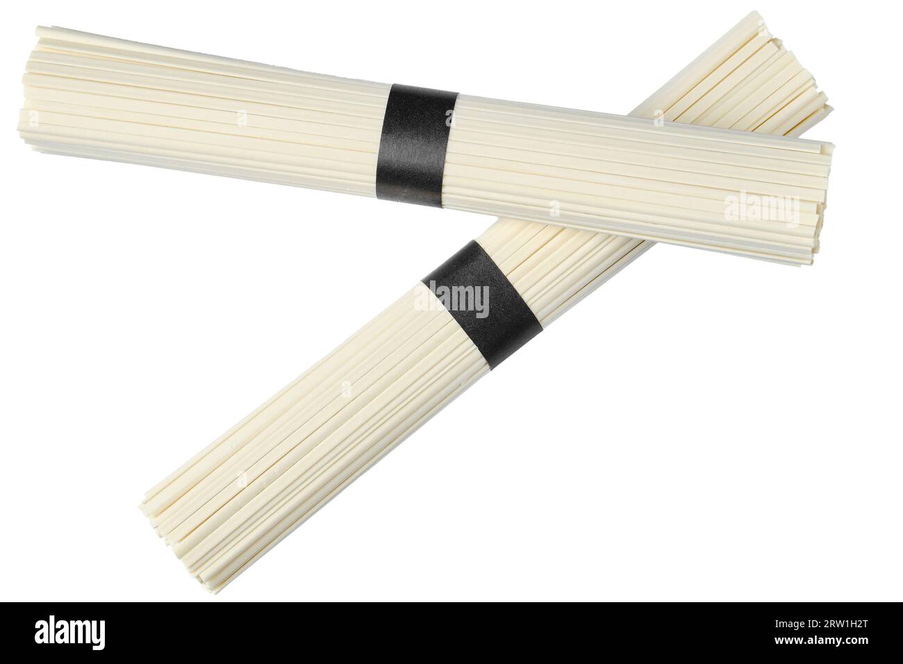 Uncooked bunch of Udon noodle isolated on white background Stock Photo