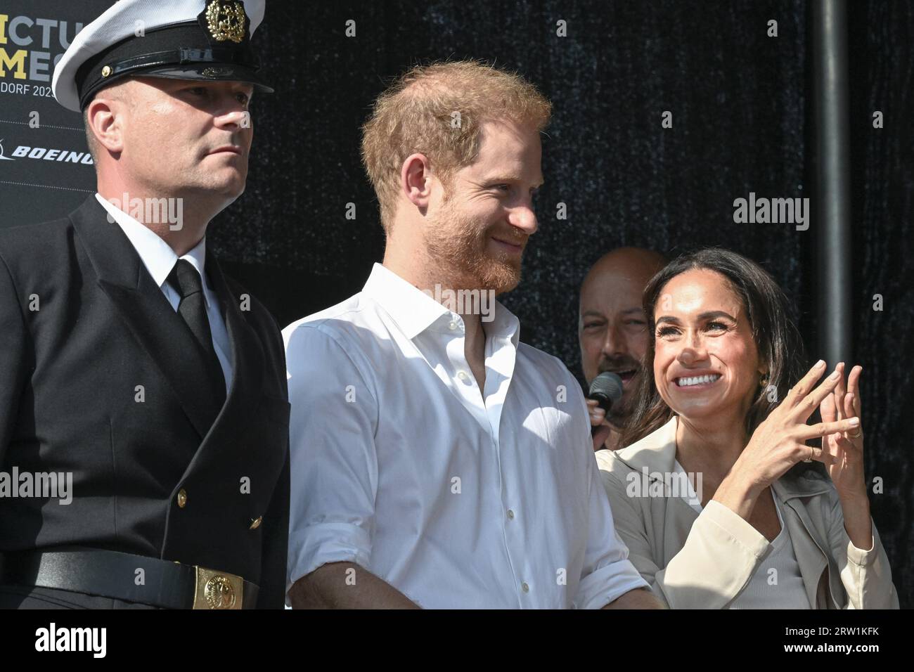 Düsseldorf, Germany. 16th Sep, 2023. Meghan, the Duchess of Sussex and Prince Harry, the Duke of Sussex attend the swimming medals ceremony on stage in the Invictus Village and hand out medals to several of the winners. Day 6 of the Invictus Games Düsseldorf in and around the Merkur Spiel Arena. 21 nations participate in the games this year. Credit: Imageplotter/Alamy Live News Stock Photo