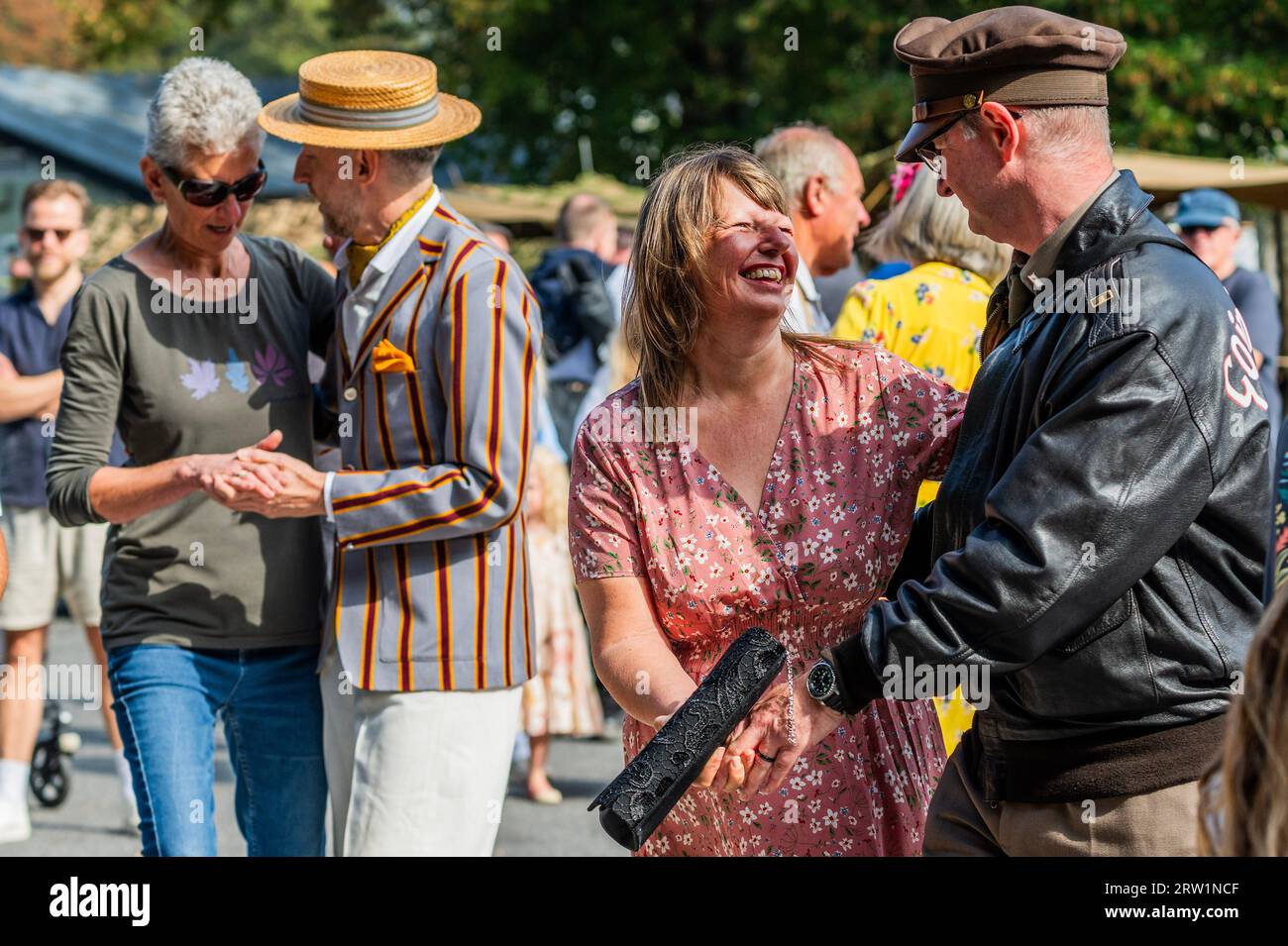 Duxford, UK. 16th Sep, 2023. Plenty of people wear period cosrume and dnace to music of the era - The Duxford Battle of Britain Air Show at the Imperial War Museum (IWM) Duxford. Credit: Guy Bell/Alamy Live News Stock Photo