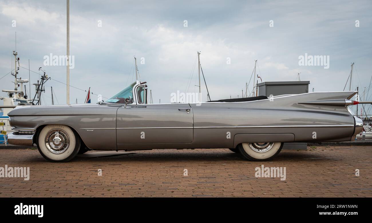 Lelystad, The Netherlands, 18.06.2023, Side view of Vintage Cadillac Series 6200 from 1959 at The National Oldtimer Day Stock Photo