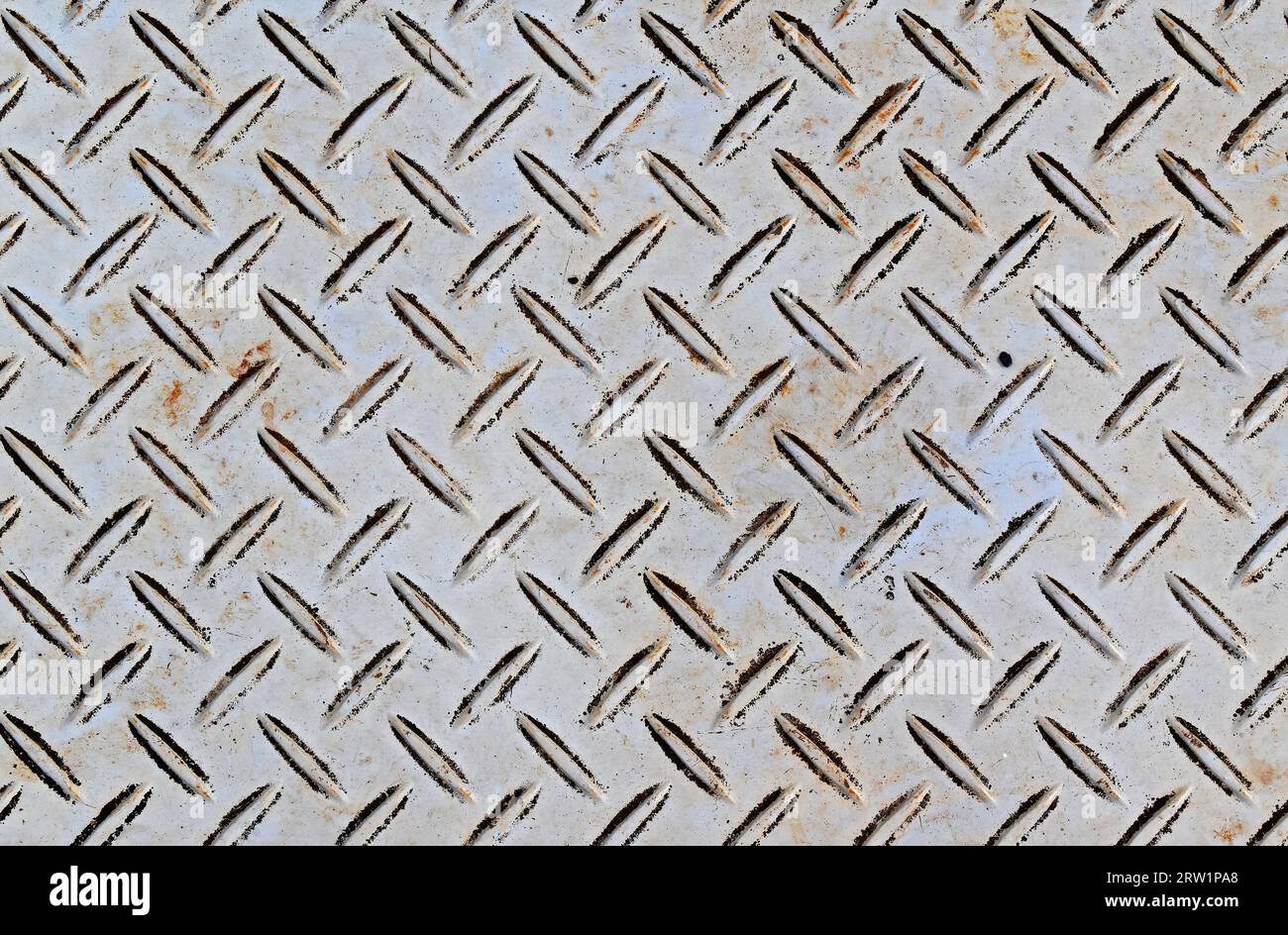 Metallic surface pattern on floor Stock Photo
