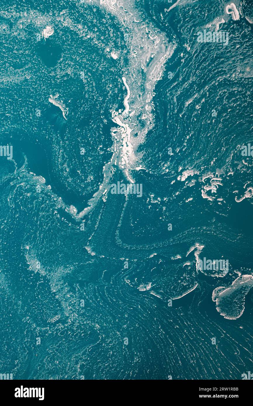 Surface of blue house paint that has separated Stock Photo Alamy