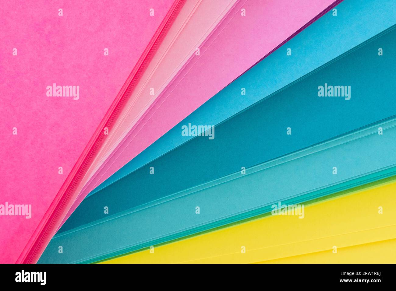 Colored paper in bright tones and spread out Stock Photo