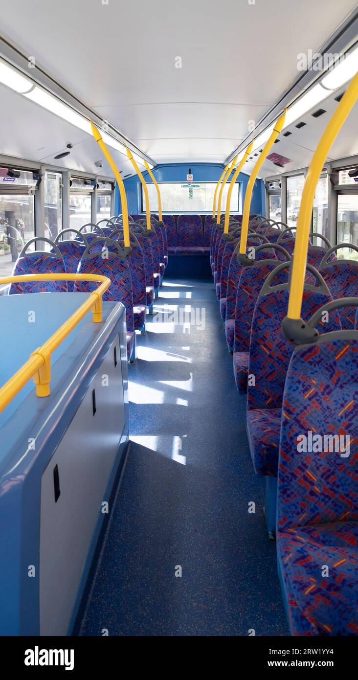 Vertical view of empty seats nobody top of double decker London bus interior inside public transport in England UK 2023 Great Britain KATHY DEWITT Stock Photo
