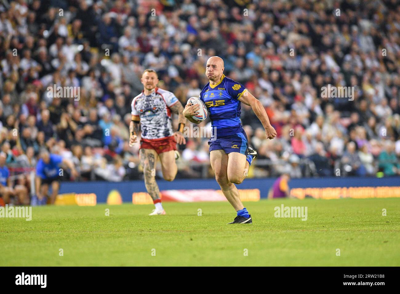 Leigh, England 15th September 2023 Wakefield Trinity's Lee Kershaw breaks away to score try