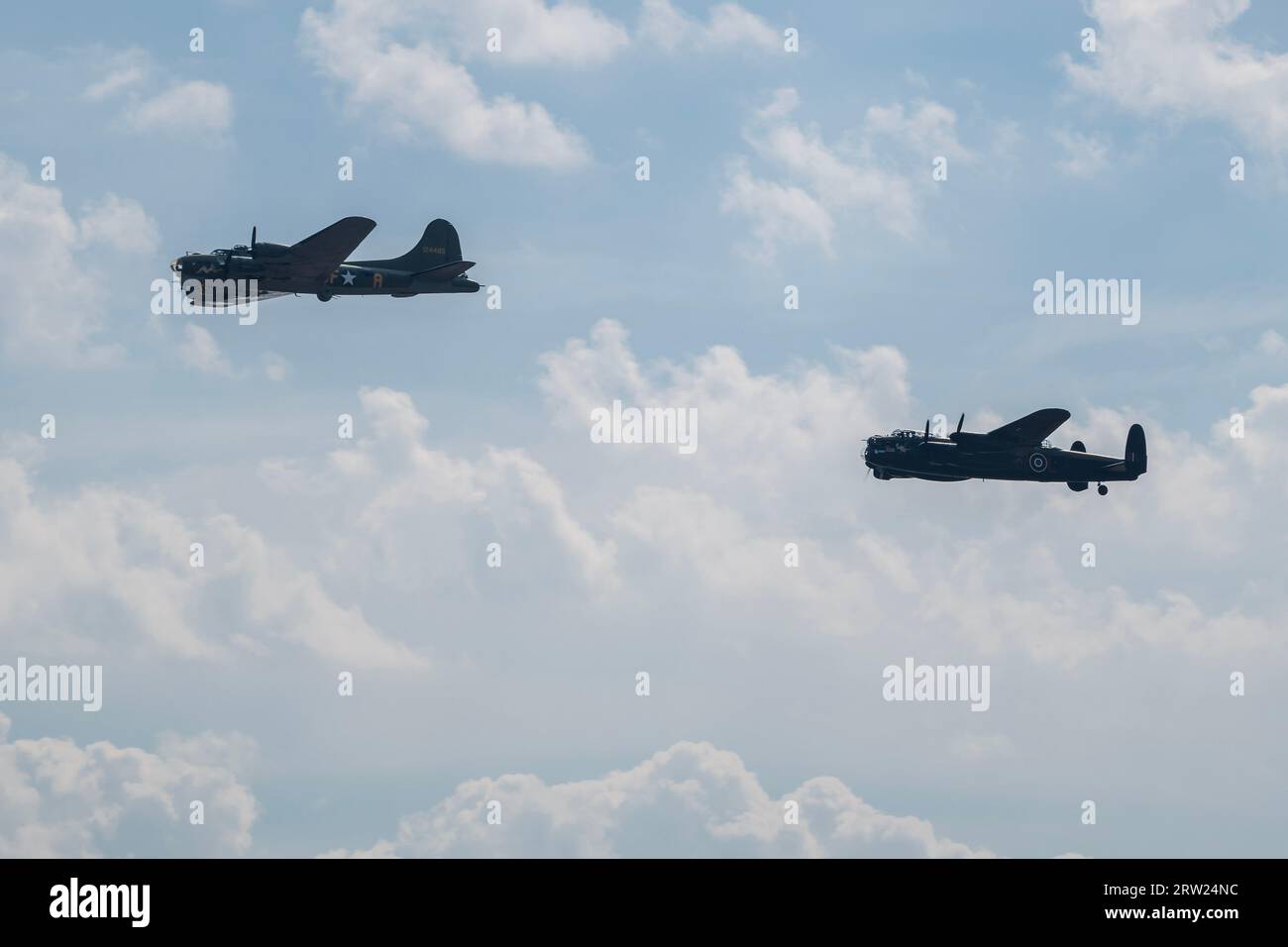 Duxford, UK. 16th Sep, 2023. Bomber Formation, Boeing B-17 Flying Fortress, Sally B, and Avro Lancaster B1 - The Duxford Battle of Britain Air Show at the Imperial War Museum (IWM) Duxford. Credit: Guy Bell/Alamy Live News Stock Photo