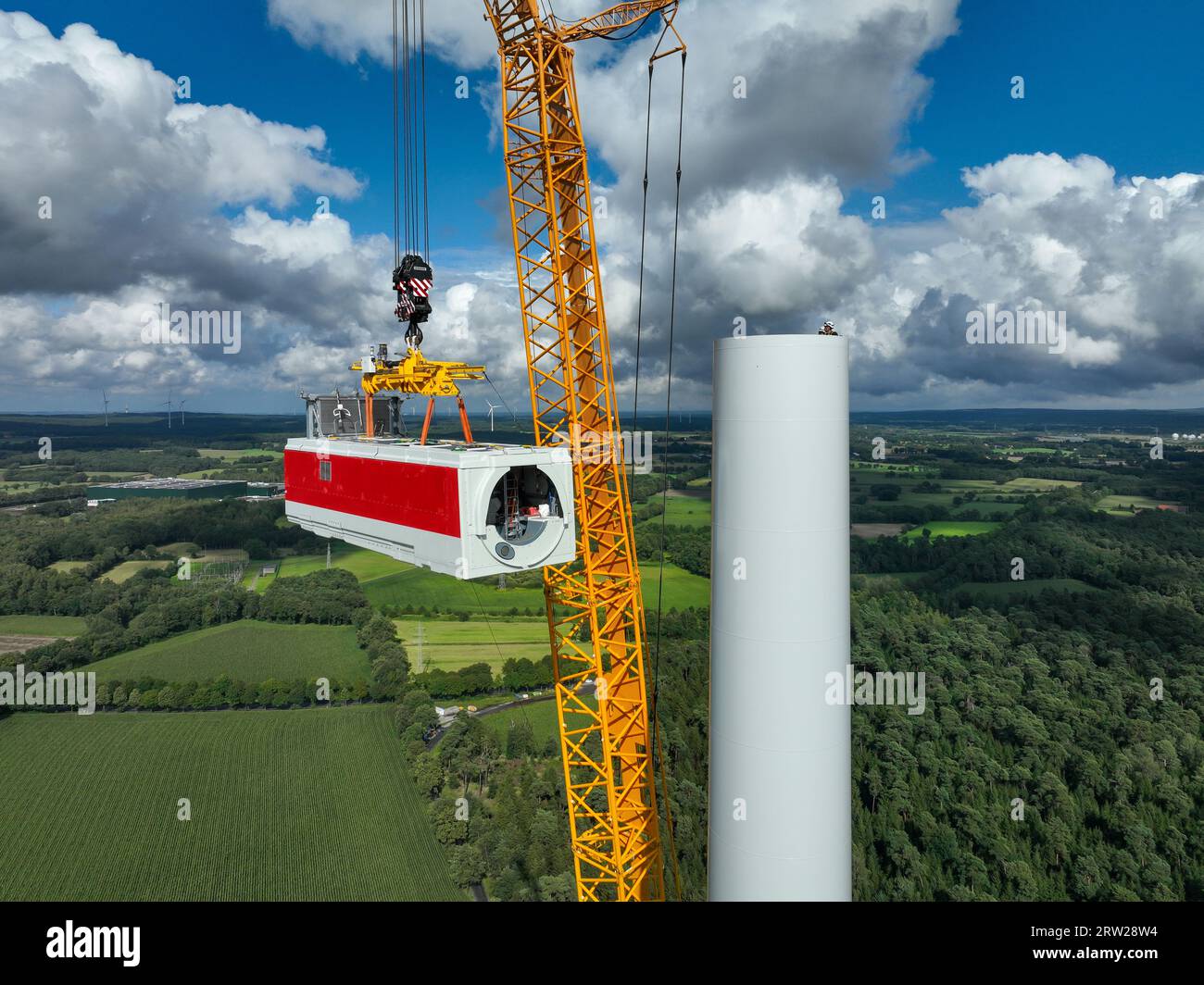 12.08.2023, Germany, North Rhine-Westphalia, Dorsten - Construction of a wind turbine, the first wind turbine of the Grosse Heide wind farm. A mobile Stock Photo