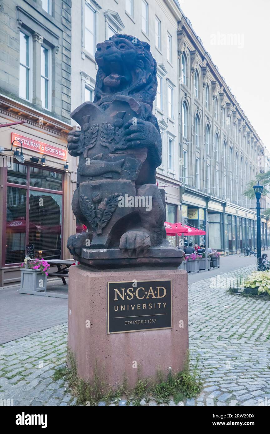 NSCAD University Banner and statue at entrance of the Campus, Halifax Downtown.  Nova Scotia College of Art and Design. HALIFAX, NOVA SCOTIA, CANADA Stock Photo