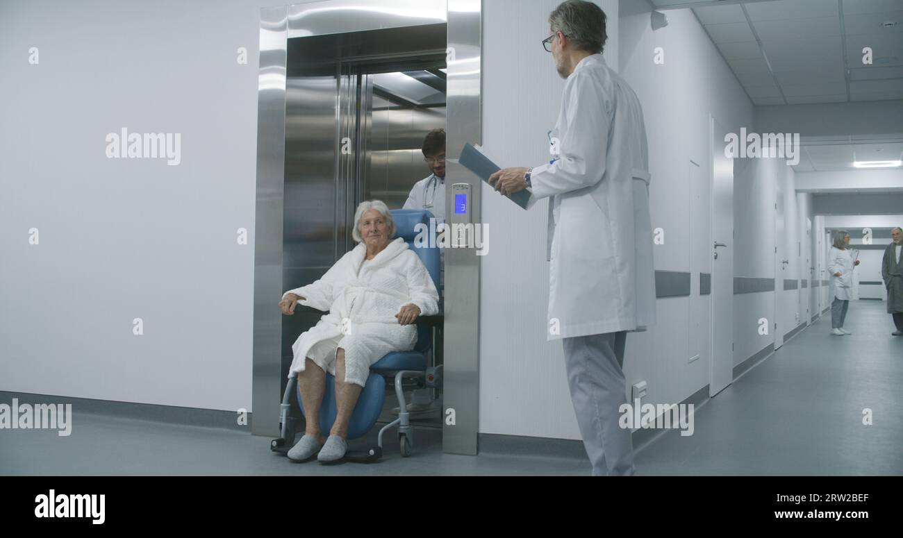 Hospital wheelchair in elevator hi-res stock photography and images - Alamy