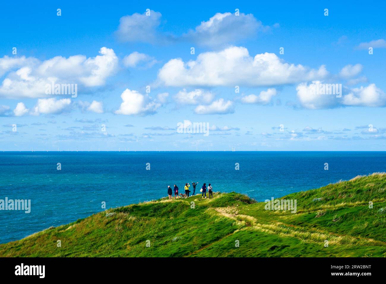 Tourists visiting the coastline near Étretat in Normandy/France Stock Photo