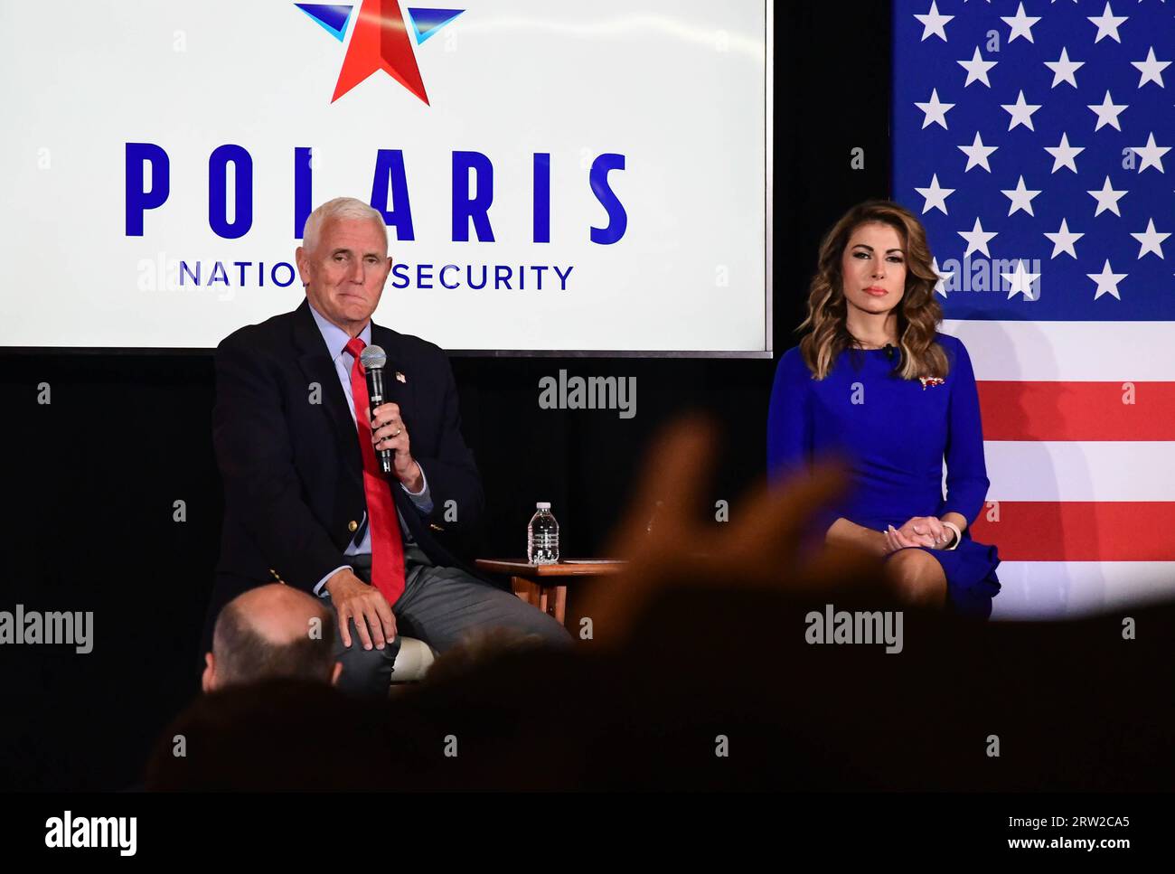 Bedford, N.H., USA, 5 August, 2023: Former Vice President Mike Pence on stage with Morgan Ortagus of Polaris National Security, Andrew Cline. Stock Photo