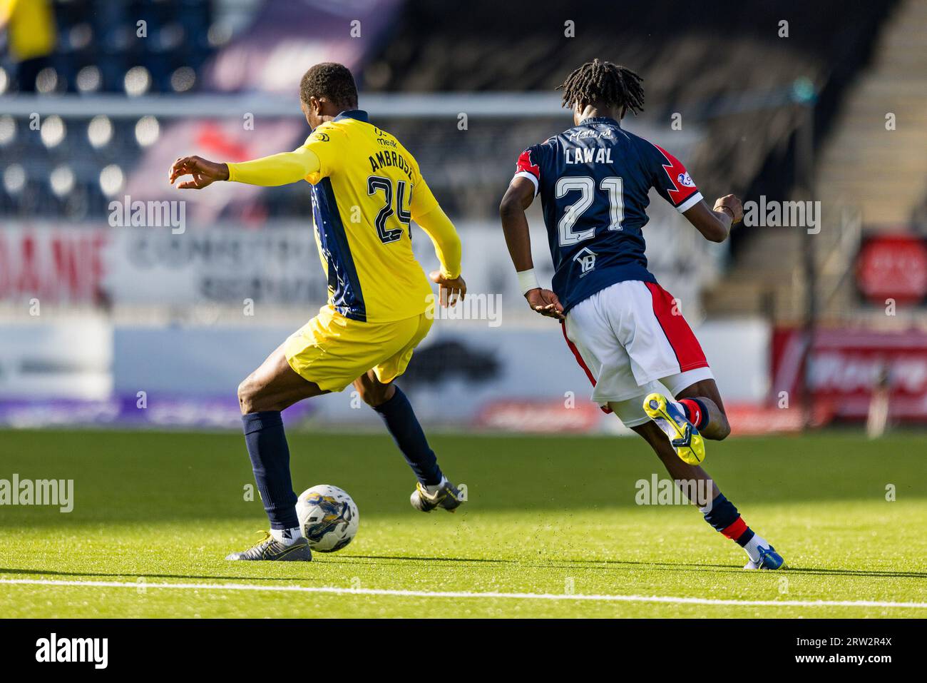 Falkirk, Scotland. 16 September 2023.  Efe Ambrose (24 - Queen of the South) and Ola Lawal (21 - Falkirk) battle for the ball  Falkirk Vs Queen of the South, Cinch League One  Credit: Raymond Davies / Alamy Live News Stock Photo