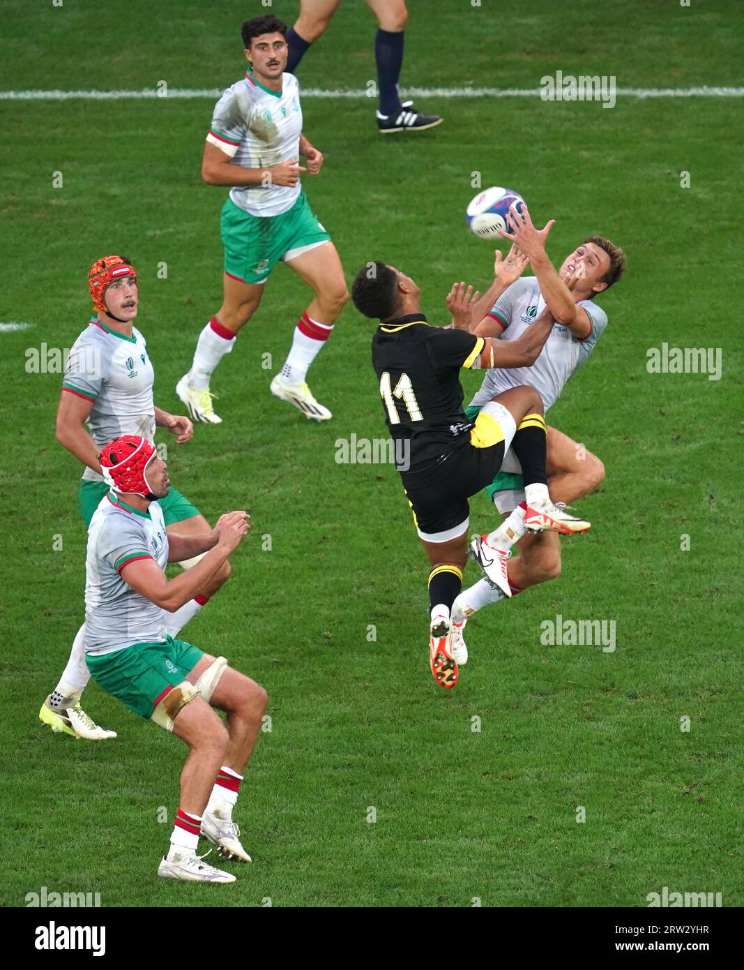 Wales' Rio Dyer (left) and Portugal's Jeromino Portela jump for the ball during the Rugby World Cup 2023, Pool C match at the Stade de Nice, France. Picture date: Saturday September 16, 2023. Stock Photo