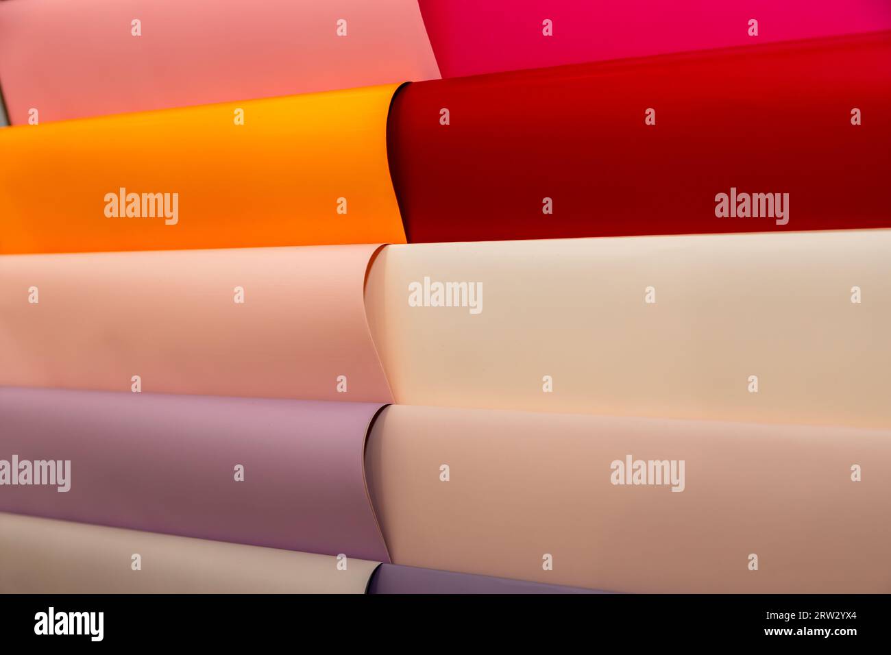 many rolls of wrapping paper or film for gifts and packing bouquets (wallpaper Stock Photo Alamy