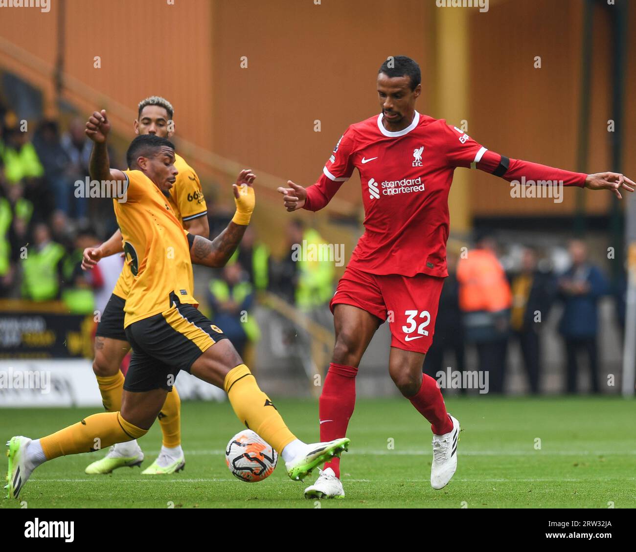 Mario Lemina #5 of Wolverhampton Wanderers tackles Joel Matip #32 of Liverpool during the Premier League match Wolverhampton Wanderers vs Liverpool at Molineux, Wolverhampton, United Kingdom, 16th September 2023  (Photo by Mike Jones/News Images) Stock Photo
