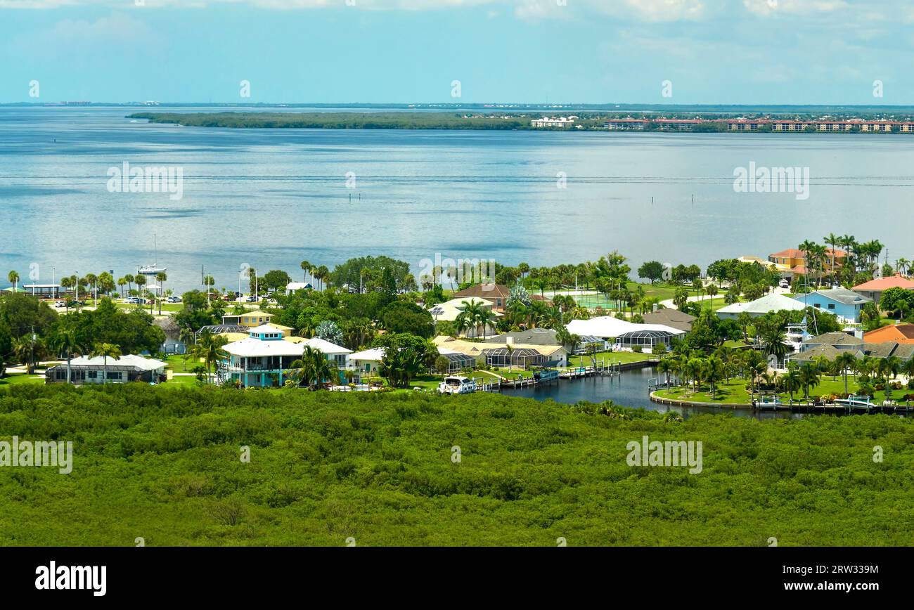 Aerial view of rural private houses in remote suburbs located near ...