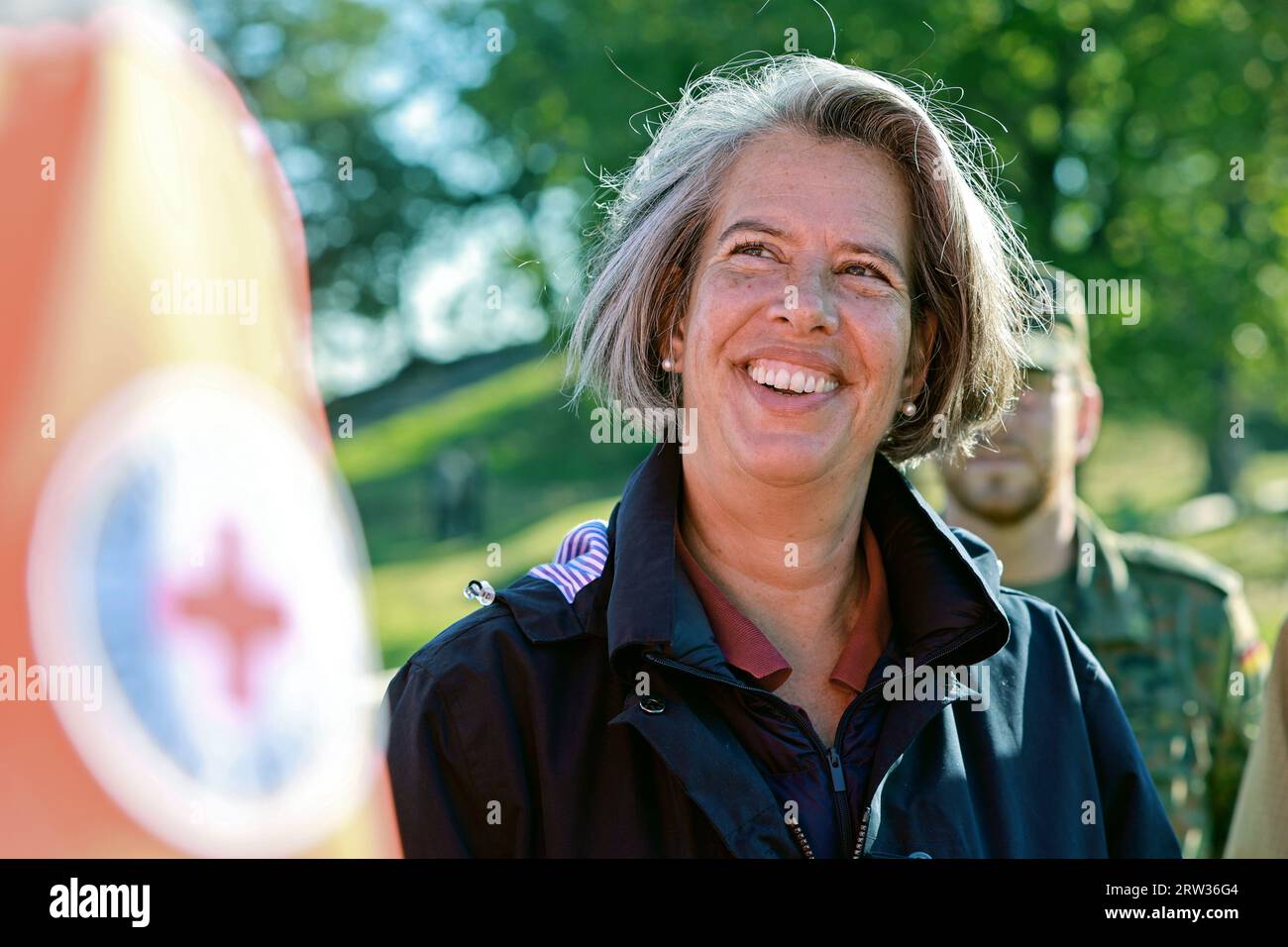 Blankenburg, Germany. 15th Sep, 2023. Saxony-Anhalt's Minister of the Interior Tamara Zieschang (CDU) stands with emergency personnel from the mountain rescue service and the police after a rescue exercise. Air rescue is also an important component in the Harz Mountains for rescuing injured people in impassable terrain. Credit: Matthias Bein/dpa/Alamy Live News Stock Photo